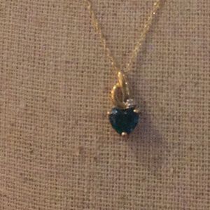 10kt gold Diamond And 1ct emerald necklace